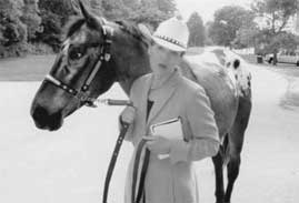 Sandy Denarski and one of her four-footed supporters.